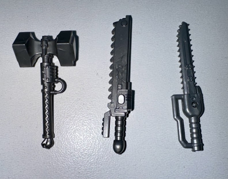 Vibro-saw and vibro-hammer melee weapons with heavy-duty designs