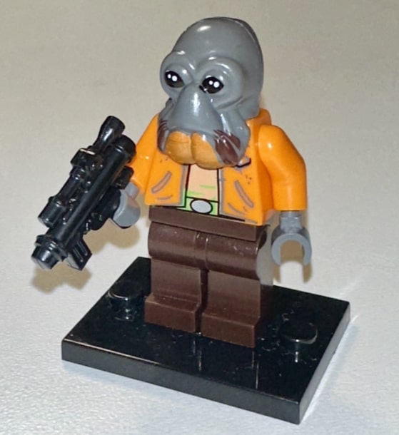 Aqualish mercenary aiming a ranged weapon in a blaster fight