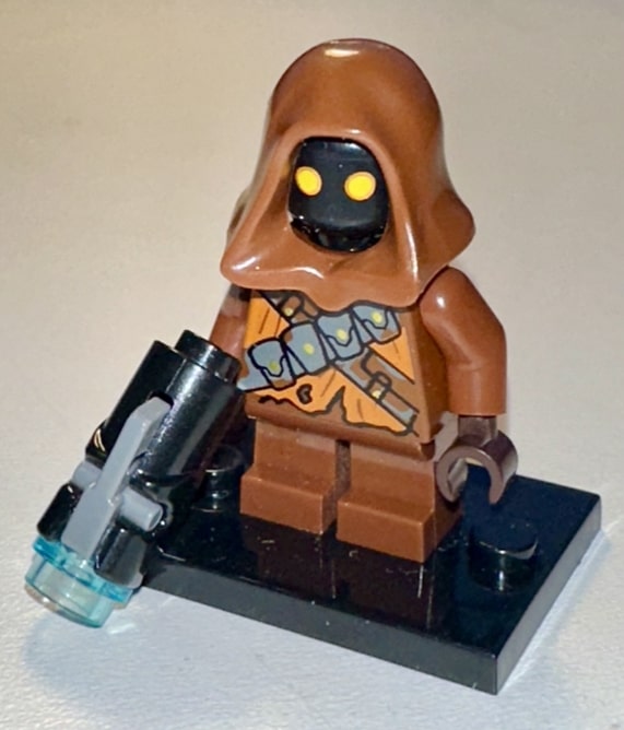 Jawa aiming a ranged weapon in the desert