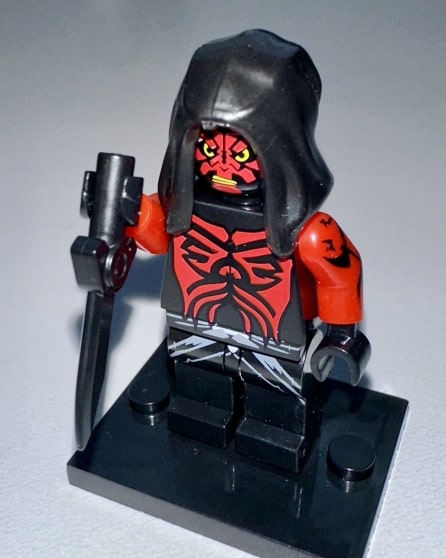 Nightbrother assassin weilding a vibro-dagger.