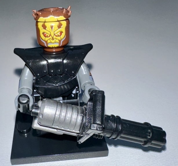 Nightbrother commando weilding a heavy repeating blaster.