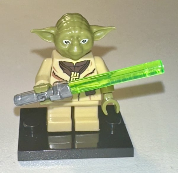 Tridactyl Force adept wielding a short lightsaber in a focused stance