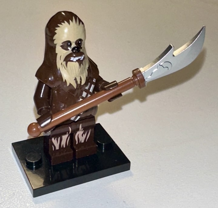 Wookiee warrior wielding a ryyk blade in close combat