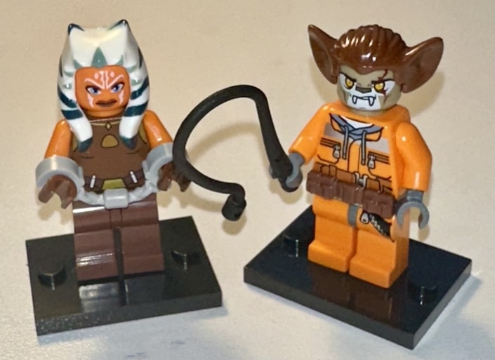 Zygerrian slaver with a hand-cuffed Togruta slave